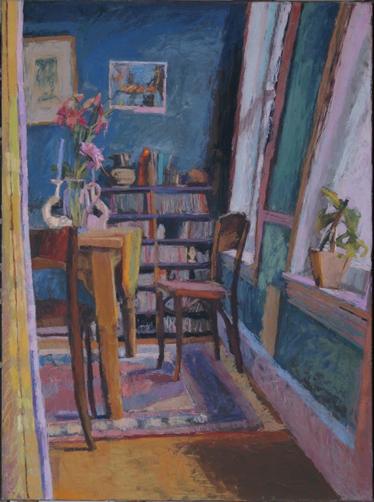 colorful interior of a dining room looking through a doorway