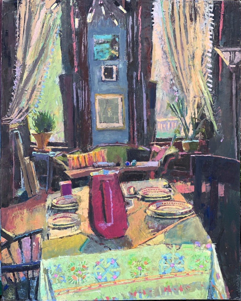 interior, at an angle, with windows in the background and a table with a lime green tablecloth and a red vase on it
