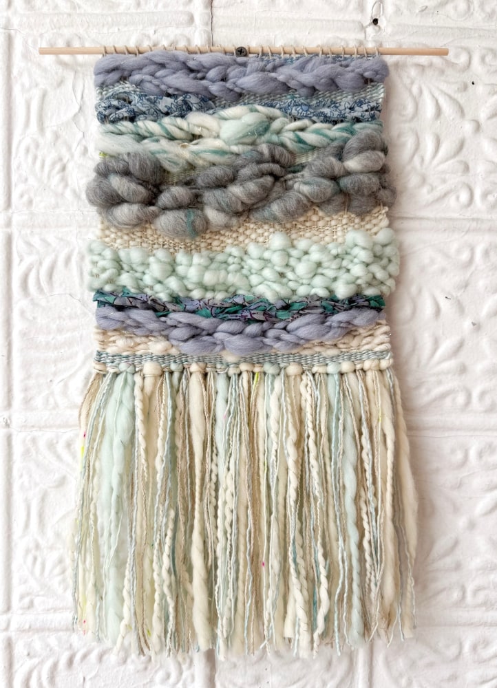 weaving in wool and cotton in creams and blues