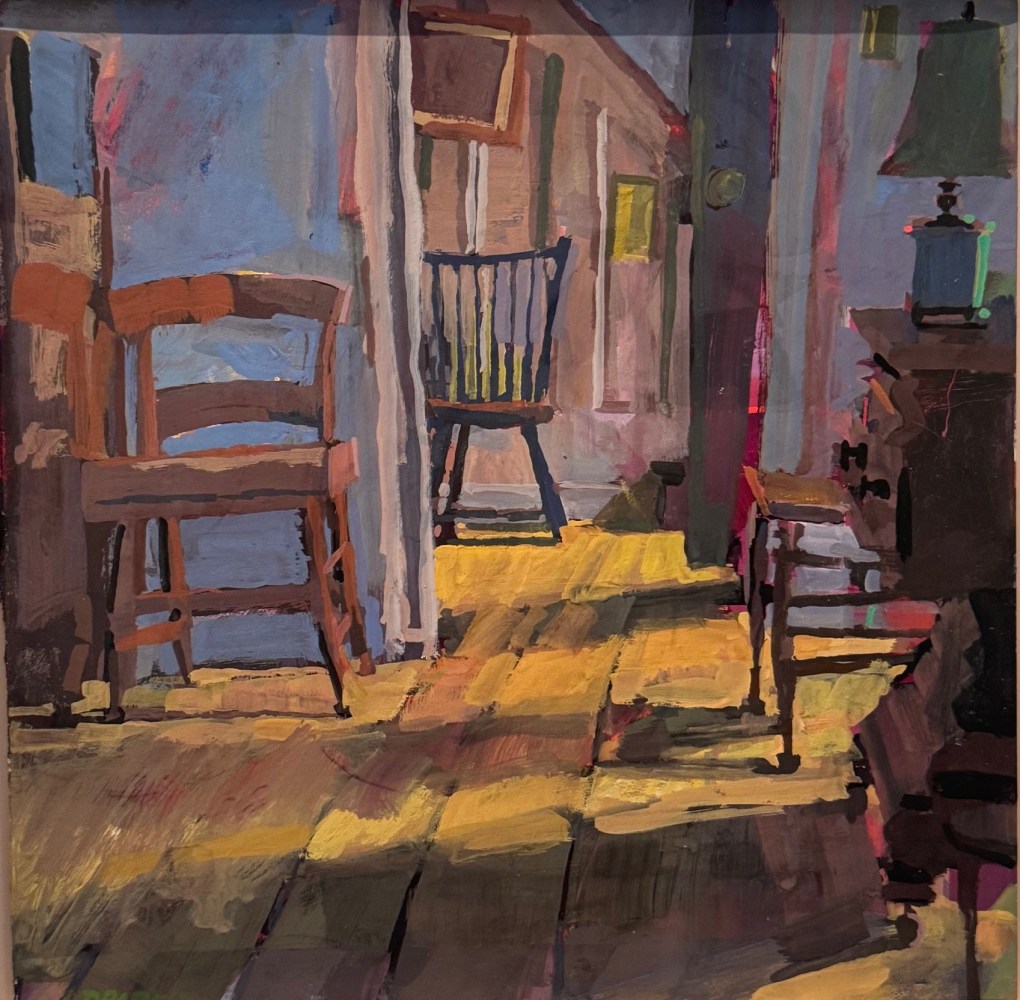 attic interior with wooden floor and three wooden chairs