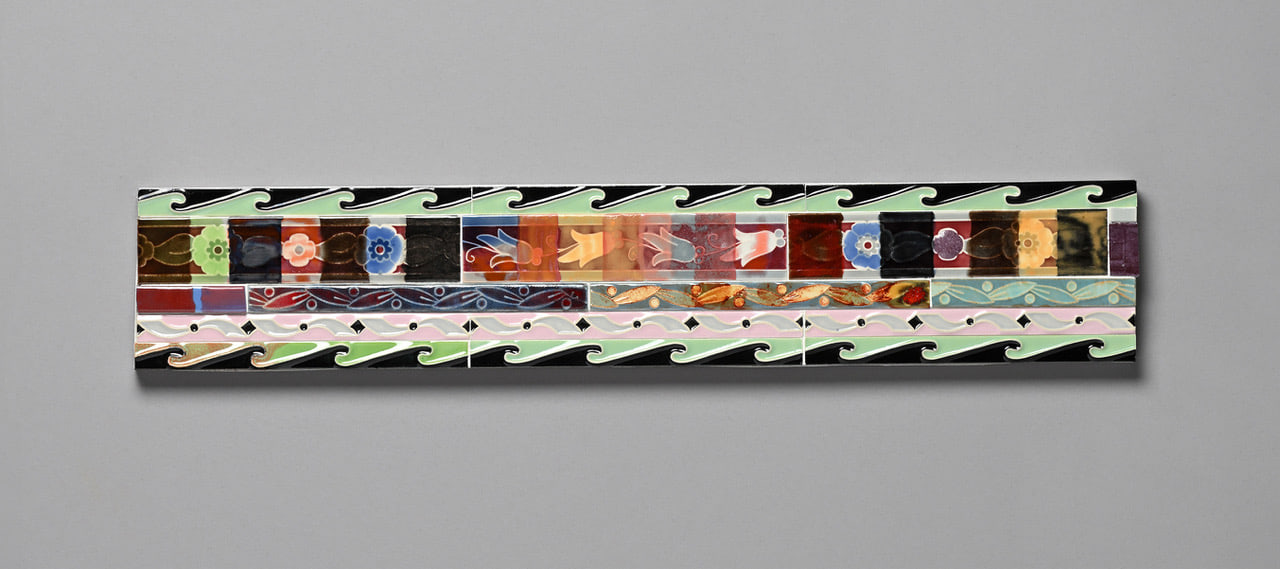 a thin horizontal collage of ceramic tiles