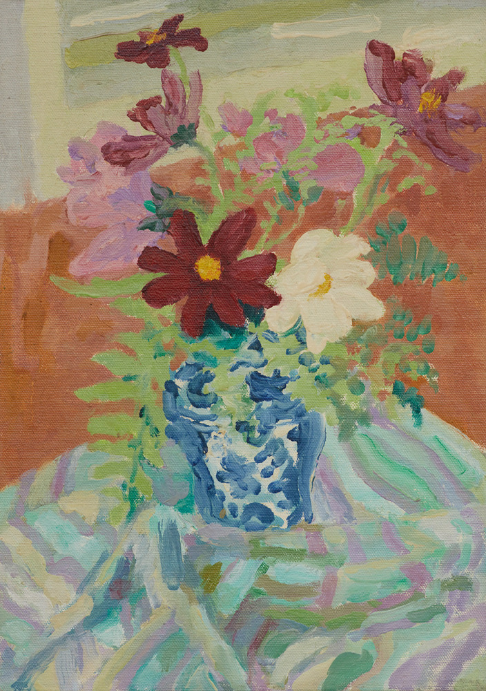 cosmos flowers in a vase on a table