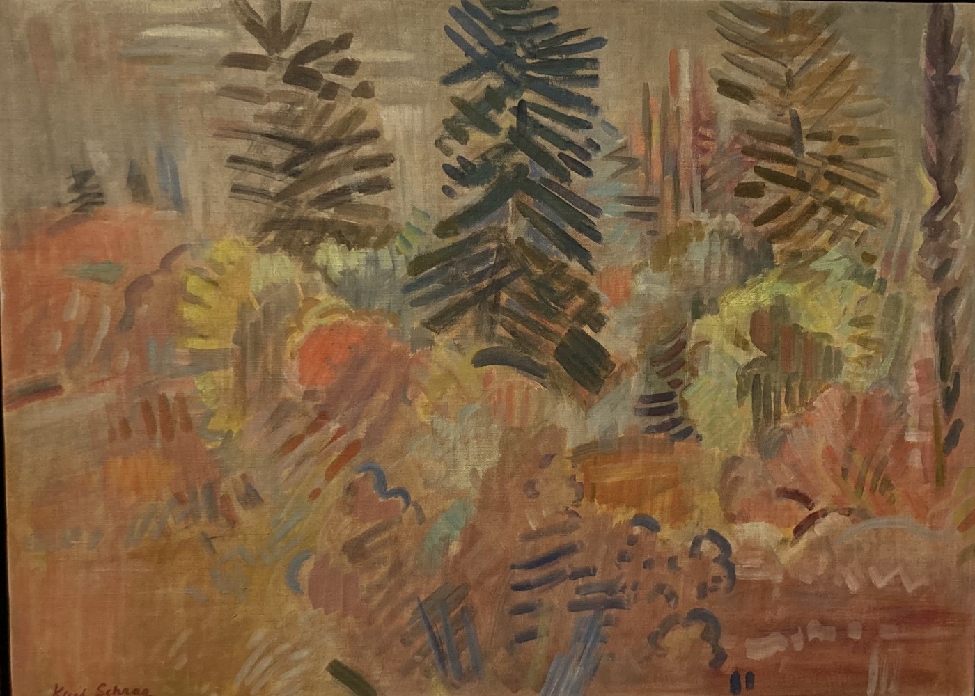 red brown landscape with trees in lack