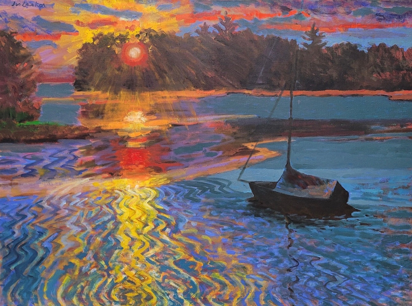 a boat in a cove as the sun sets with bright colors reflected on the water