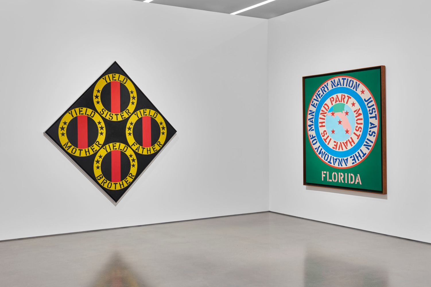 Installation view of Robert Indiana: The American Dream, Pace Gallery, New York, May 9&amp;ndash;August 15, 2025. Left to right, The Black Yield Brother III (1963&amp;ndash;64) and Florida (1966)