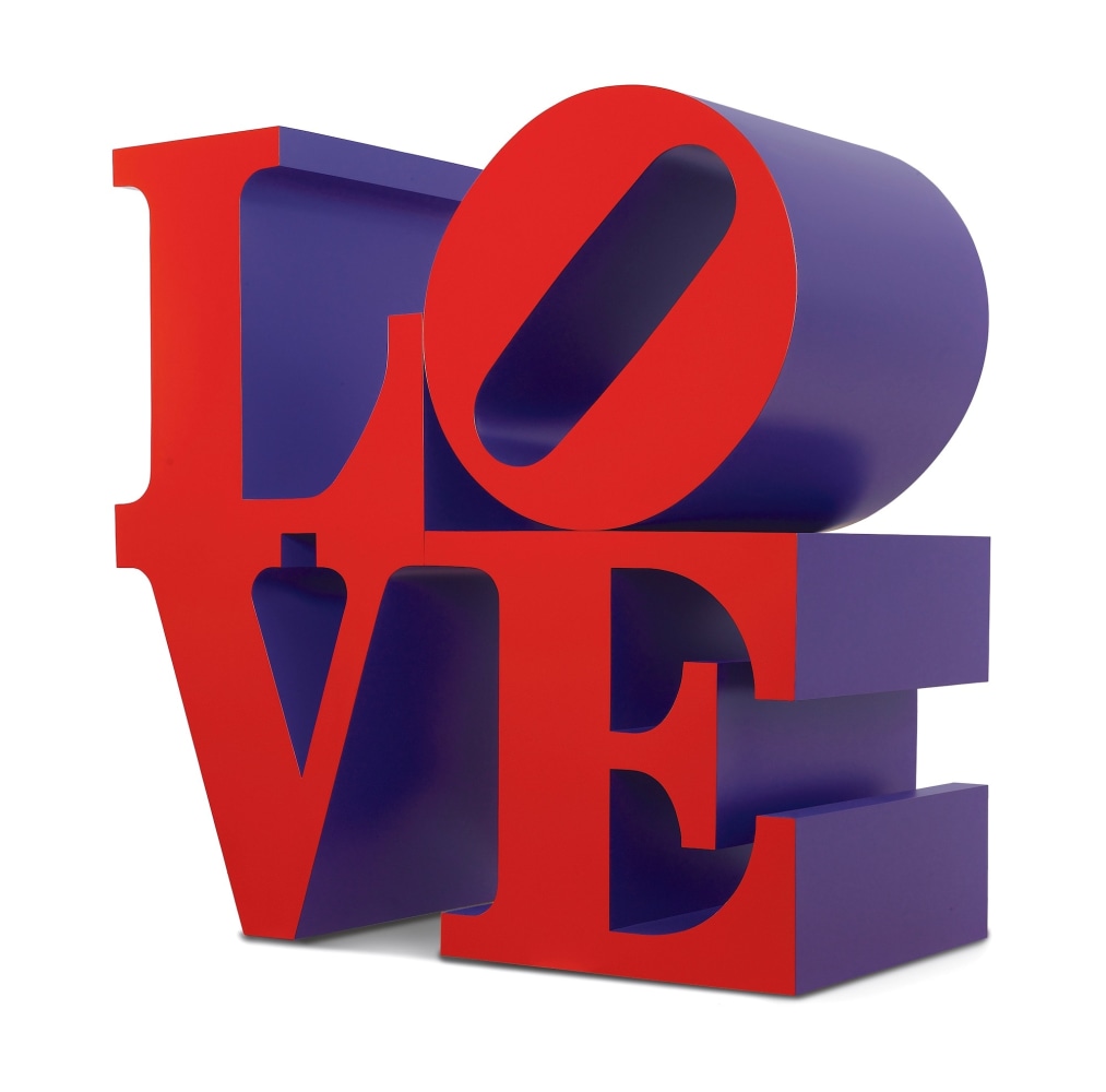 Red faces violet sides LOVE sculpture, with the letter L and a tilted O atop the letters V and E