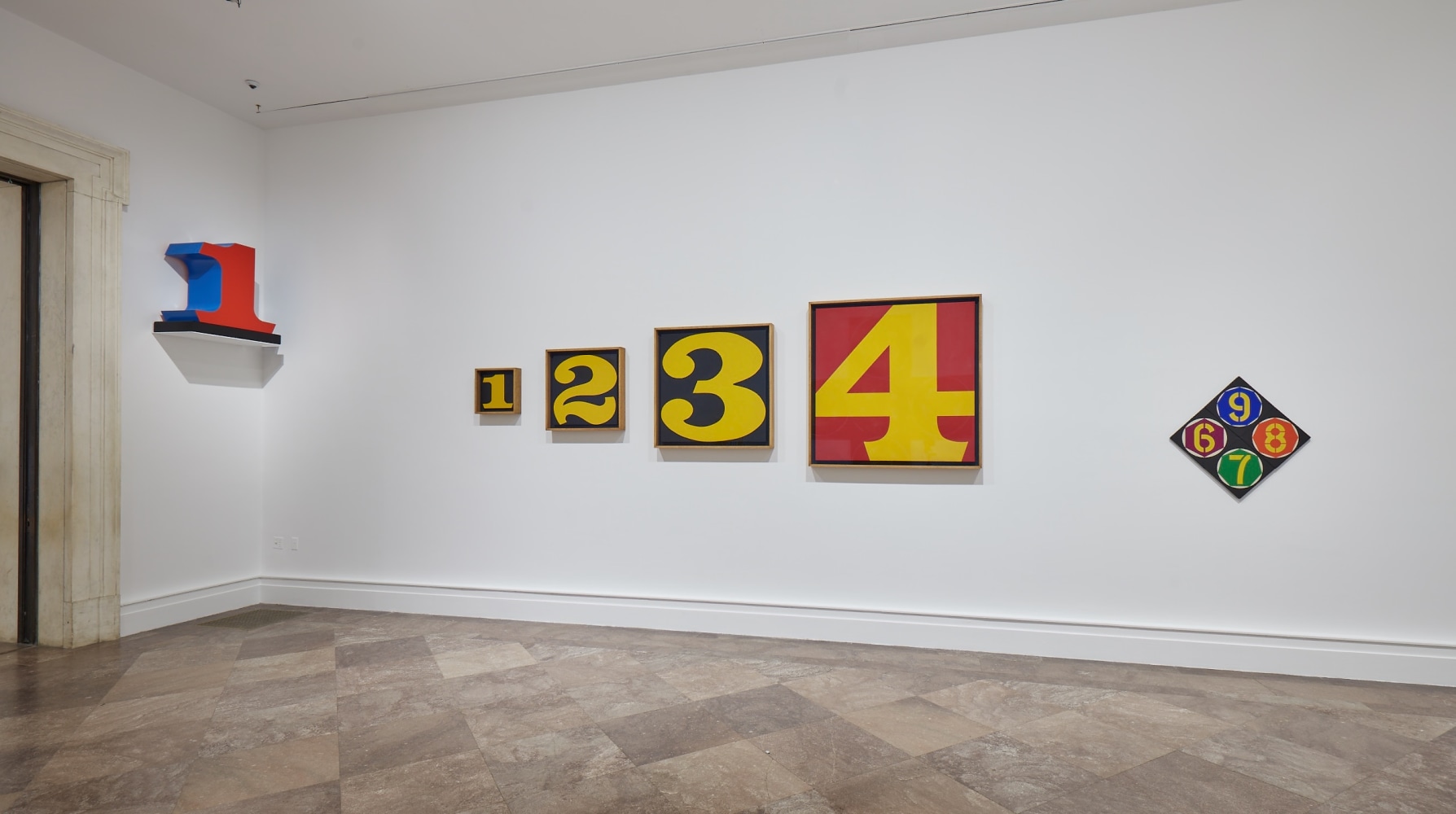 Installation view of&amp;nbsp;Robert Indiana: A Sculpture Retrospective, Albright-Knox Art Gallery, Buffalo, June 16&amp;ndash;September 23, 2018. Left to right, ONE (1978&amp;ndash;2003), Exploding Numbers (1964&amp;ndash;66), and Small Black Diamond Polychrome Numeral Quartet Summing Thirty (1963). Photo: Tom Powel Imaging