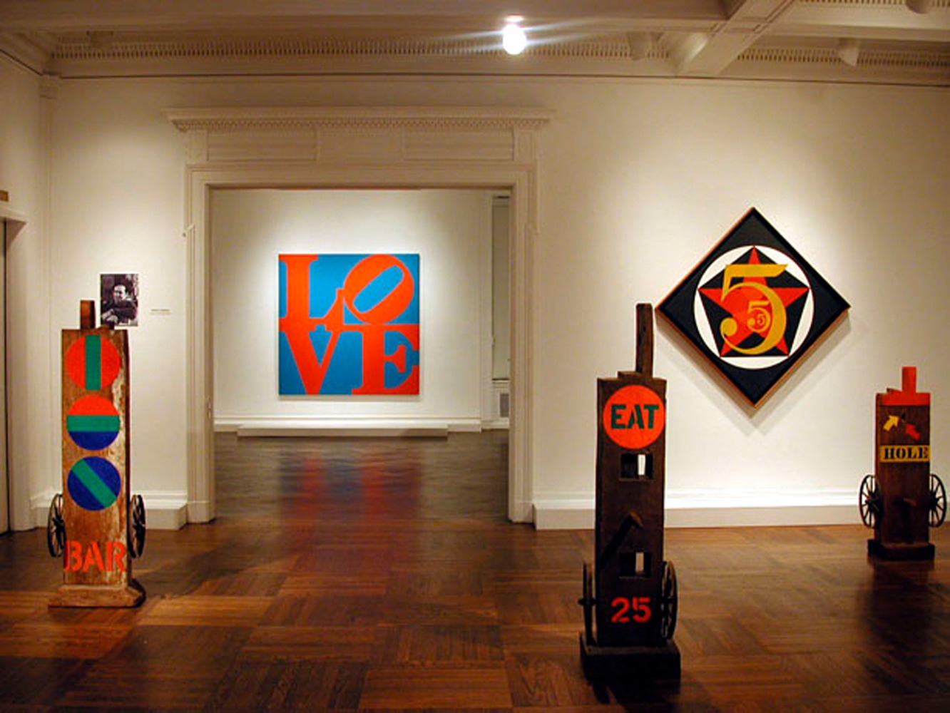 Installation view of Robert Indiana: Letters, Words and Numbers, C&amp;amp;M Arts, New York, February 13&amp;ndash;March 22, 2003. Left to right,&amp;nbsp;Bar (1960&amp;ndash;62), LOVE (1967), Eat (1962, cast 1991), The Small Diamond Demuth Five (1963), and Hole (1960&amp;ndash;62)