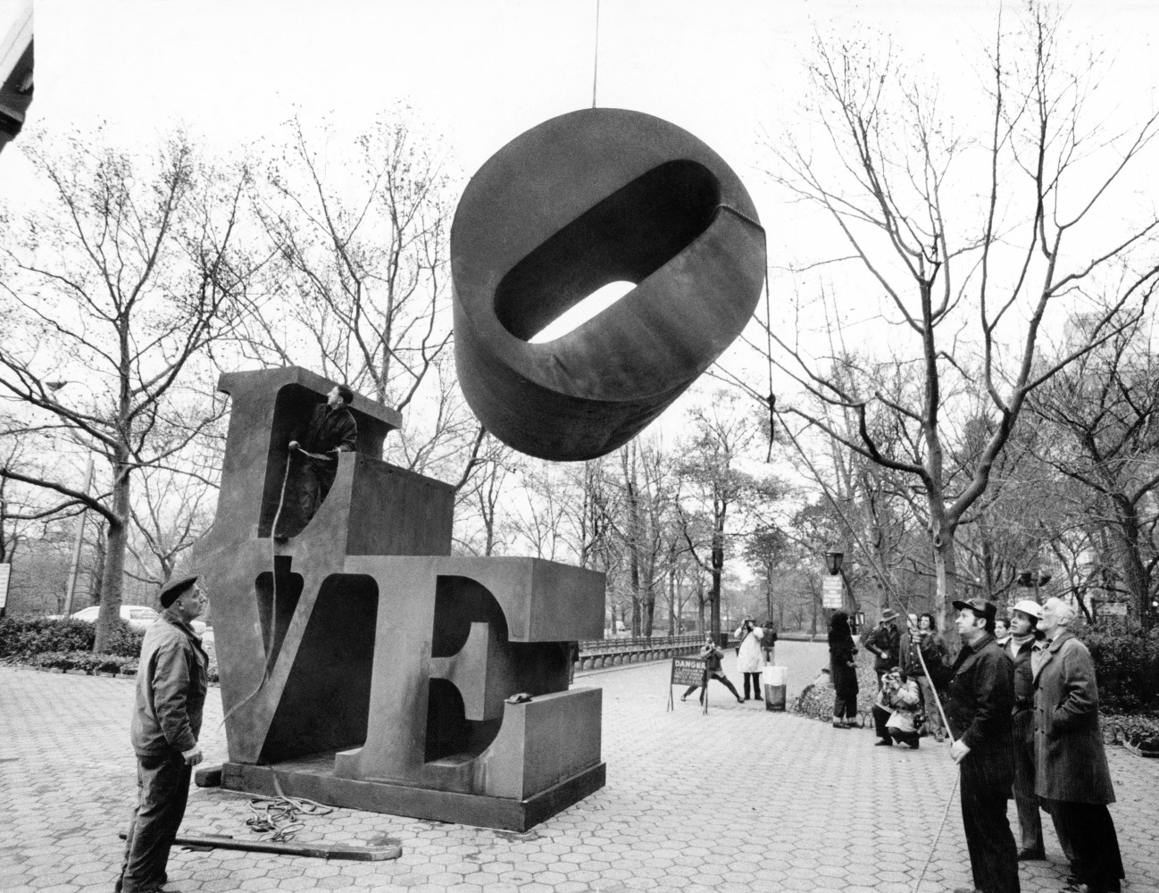 Installation of Indiana&amp;rsquo;s 12 foot LOVE (Cor-Ten steel) (1966-1970) at Fifth Avenue and 60th Street, New York, November 1971. Photo: Eliot Elisofon. Eliot Elisofon Papers and Photography Collection, 1930-1988, undated [bulk 1942-1973]. The University of Texas at Austin, Harry Ransom Center. Artwork: &amp;copy; The Robert Indiana Legacy Initiative/Artists Rights Society (ARS), NY