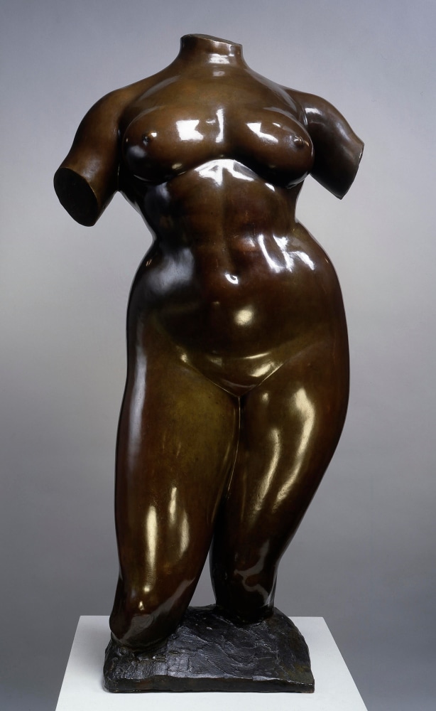 Photograph of a bronze sculpture of woman's torso