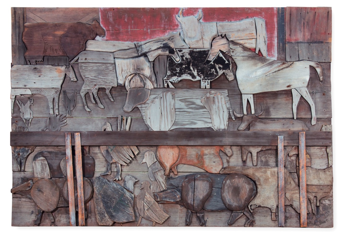 Wall-hanging sculpture of a barnyard scene composed of various pieces of wood