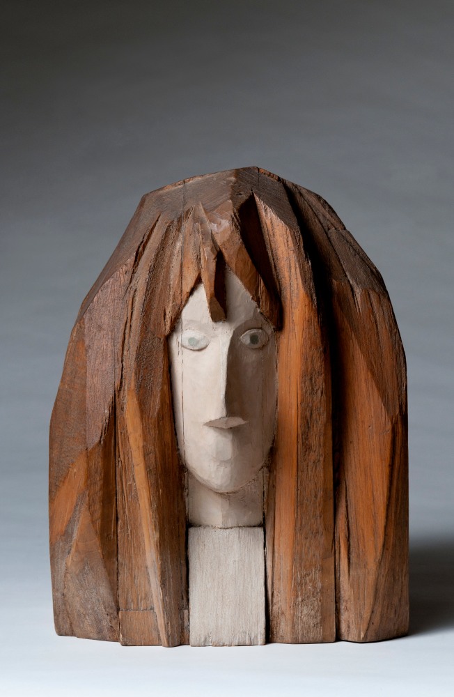 Front view of a sculpture of the head of a woman from the neck up