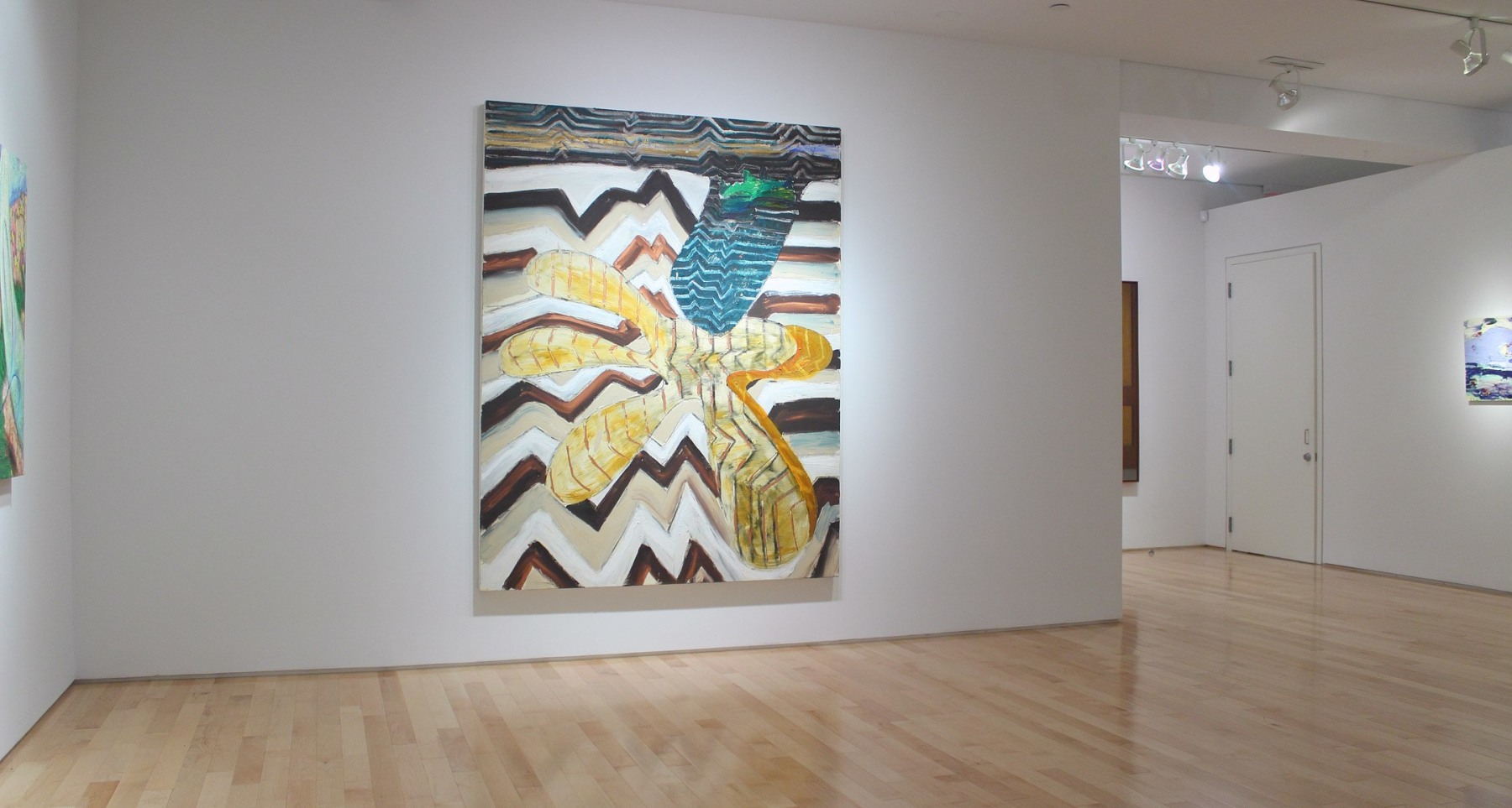 Photograph showing a view of an exhibition space, with one large painting hanging on a white wall