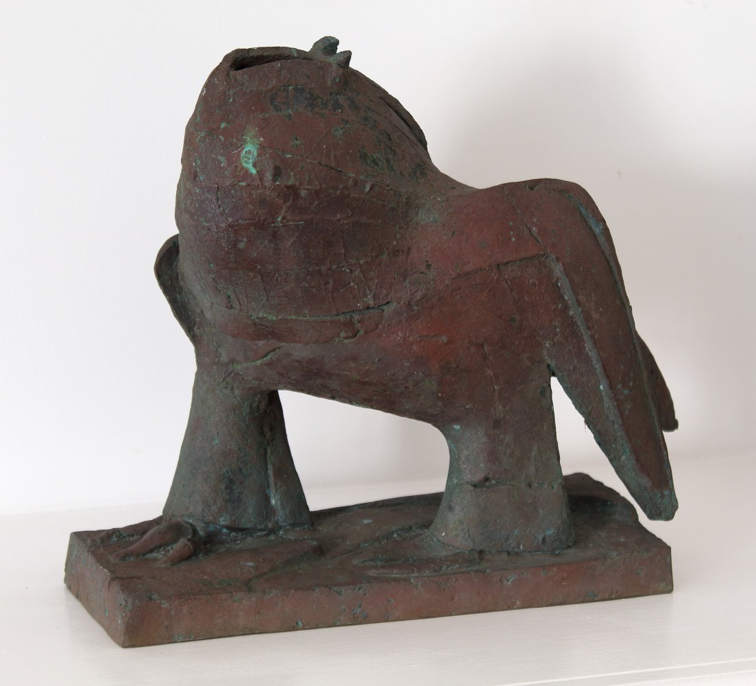 Bronze sculpture of an abstract, animal-like figure