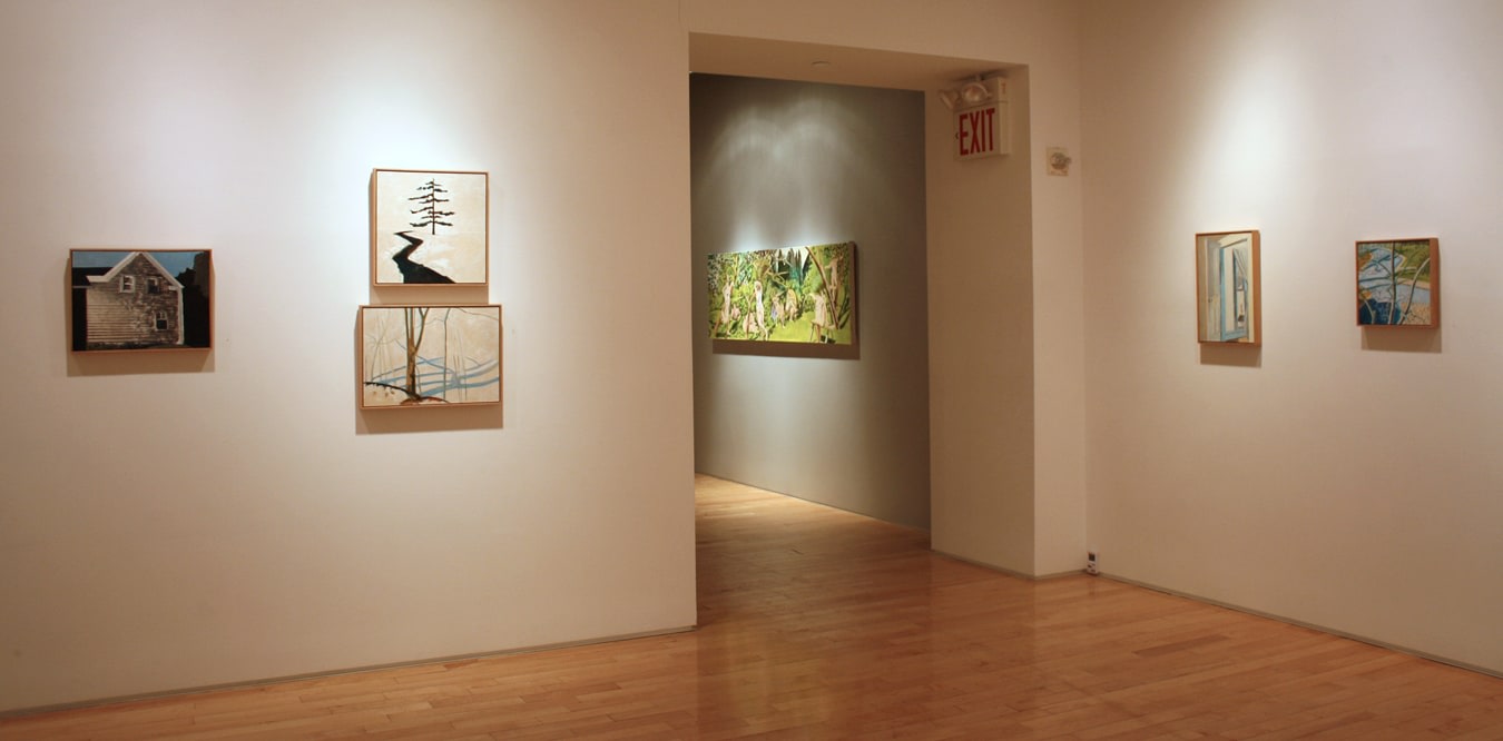 Photograph showing a view of an exhibition space, with five small framed paintings hanging on white walls, and one larger painting hanging on a grey wall in the distance