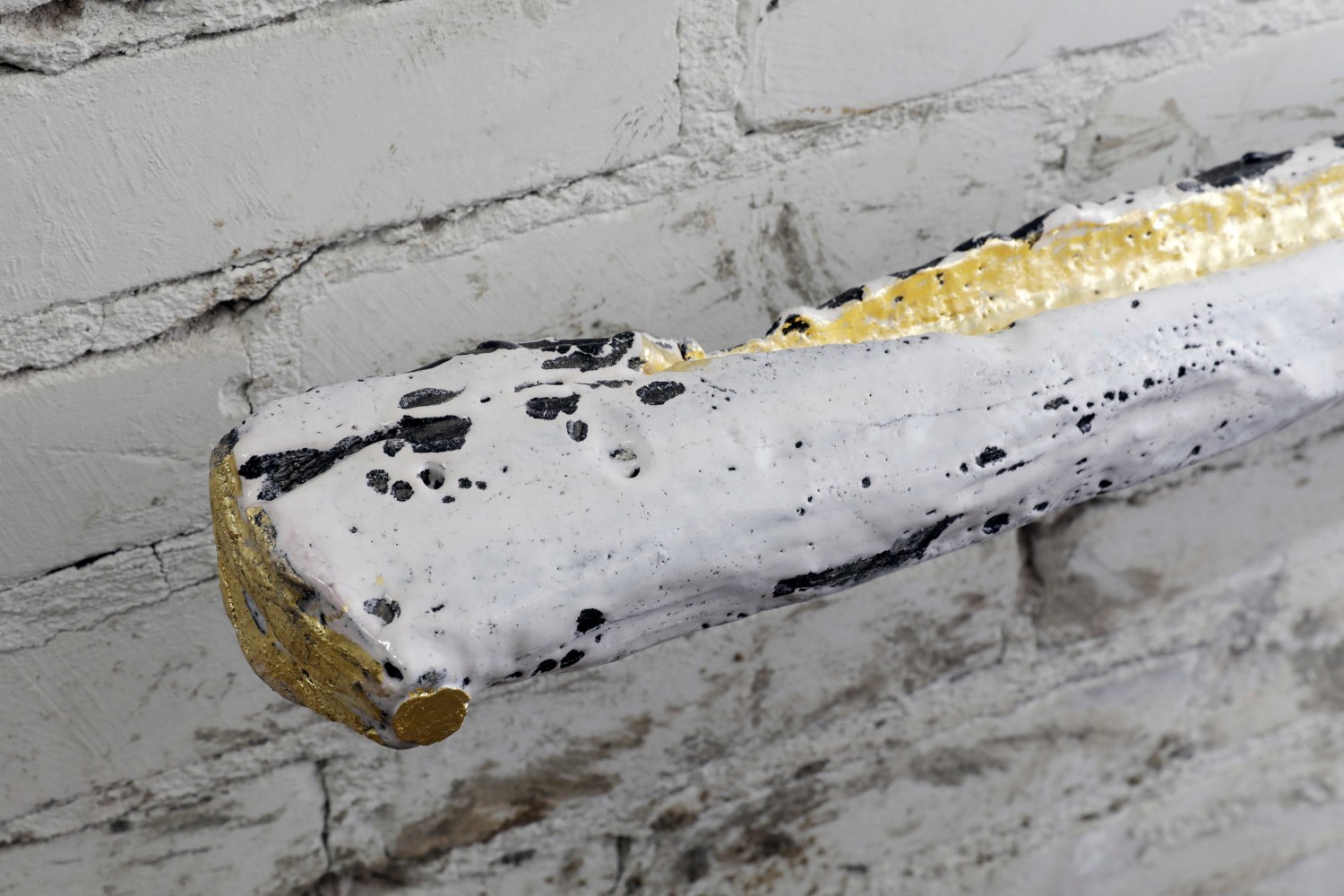 PEKKA PAIKKARI
The Origin of Winter, 2024
Glazed stoneware, 22-carat gold leaf
59" L x 4" Dia.