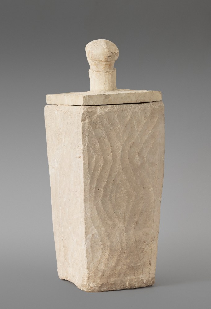 Salangsang Culture, Mindanao, Philippines Carved Limestone Covered Burial Jar, c. 600 A.D. carved limestone ossuary (burial jar) 27 1/2 x 9 1/2 x 9 1/2 inches