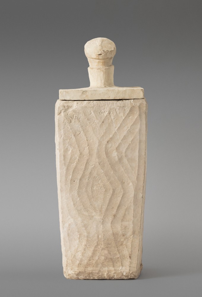 Salangsang Culture, Mindanao, Philippines
Carved Limestone Covered Burial Jar, c. 600 A.D.
carved limestone ossuary (burial jar)
27 1/2 x 9 1/2 x 9 1/2 inches