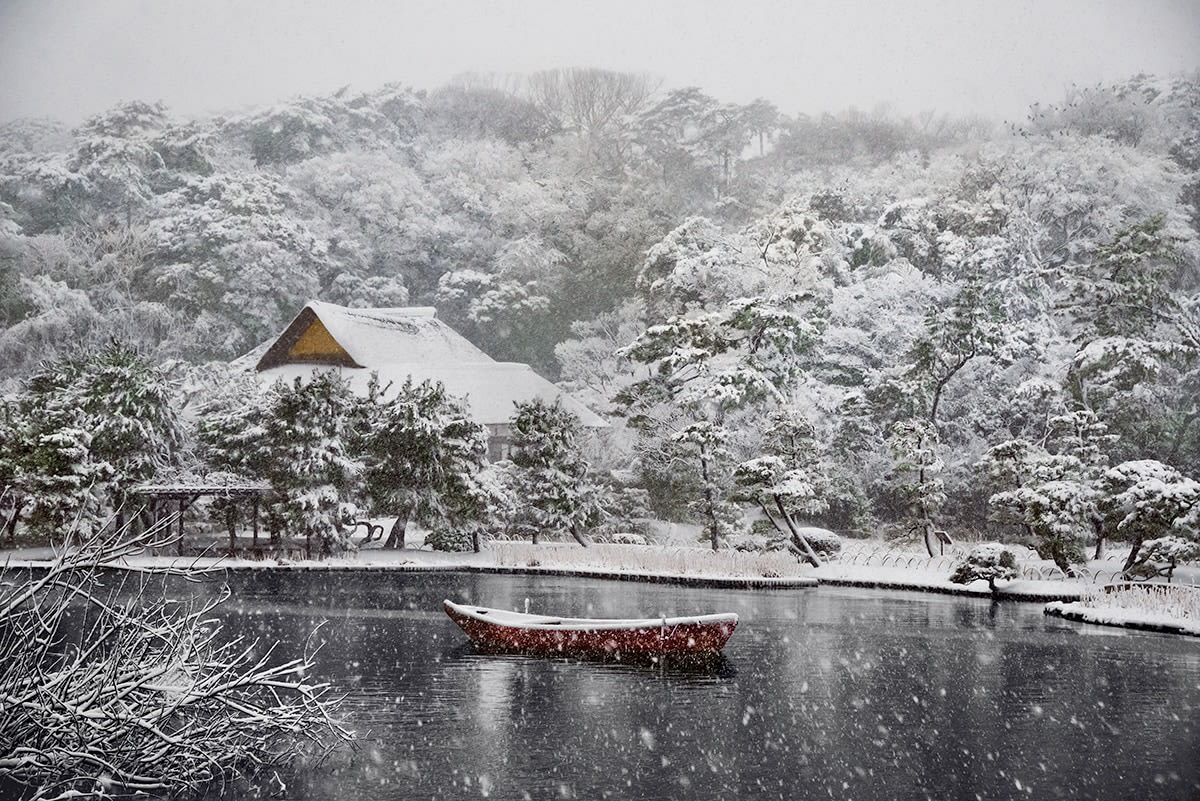 Steve McCurry  Boat Covered in Snow in Sankei-en Garden, Yokohama, Japan