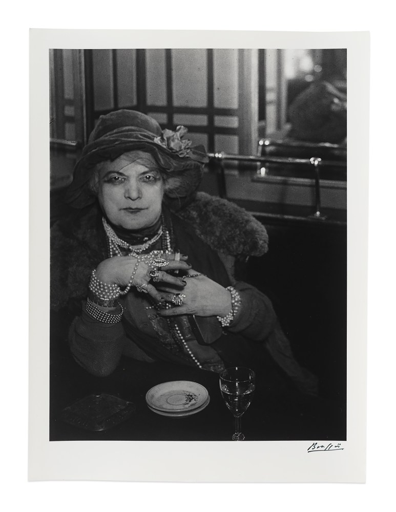 &amp;lsquo;Bijou&amp;rsquo; au bar de la Lune, Montmartre&amp;nbsp;(&amp;lsquo;Bijou&amp;rsquo;, Bar de la Lune, Montmartre), 1932&amp;nbsp;
gelatin silver print on double weight paper&amp;nbsp;
image: 13 1/2 x 10 1/4 in. / 34.3 x 26&amp;nbsp;cm

sheet: 15 5/8 x 11 1/2 in. / 39.7 x 29.2 cm&amp;nbsp;

recto:&amp;nbsp;signed, lower right&amp;nbsp;

verso:&amp;nbsp;stamped &amp;lsquo;Copyright by BRASSA&amp;Iuml; 19 All Rights Reserved&amp;rsquo;; &amp;lsquo;INTERDICTION DE REPRODUIRE SANS AUTORISATION DE L&amp;rsquo;AUTEUR&amp;rsquo;; &amp;lsquo;Tirage de l&amp;rsquo;Auteur&amp;rsquo;, inscribed &amp;lsquo;&amp;rdquo;Bijou&amp;rdquo; vers. 1932 au bar de la Lune&amp;rsquo;; &amp;lsquo;Page 86&amp;rsquo;; &amp;lsquo;Pl. 384&amp;rsquo;; &amp;lsquo;PN1208/10&amp;rsquo;&amp;nbsp;