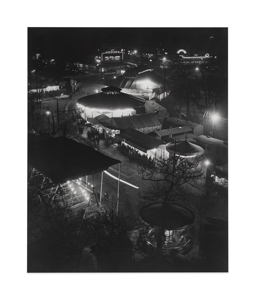 La f&amp;ecirc;te foraine, place d&amp;rsquo;Italie&amp;nbsp;(The Fun Fair, Place d&amp;rsquo;Italie), 1931&amp;nbsp;
ferrotype gelatin silver print on single weight paper

image: 10 x 8 1/2 in. / 25.4 x 21.6 cm

sheet: 10 x 8 1/2 in. / 25.4 x 21.6 cm

verso:&amp;nbsp;signed, stamped &amp;lsquo;BRASSA&amp;iuml; 81, Rue du Faub.-St-Jacques PARIS-XIVe &amp;ndash; PORt-Royal 23-41&amp;rsquo;; &amp;lsquo;COPYRIGHT by BRASSA&amp;Iuml; 81, Faubourg St. Jacques PARIS 14eme T&amp;eacute;l. 707.23.41&amp;rsquo;; &amp;lsquo;Tirage de l&amp;rsquo;Auteur&amp;rsquo;, inscribed &amp;lsquo;9&amp;rsquo;; &amp;lsquo;pp. 804&amp;rsquo;; &amp;lsquo;PN1001&amp;rsquo;&amp;nbsp;