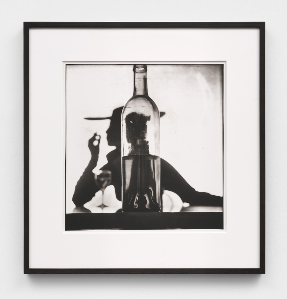 Girl Behind Bottle (Jean Patchett), New York, 1949,&amp;nbsp;1978

platinum-palladium print mounted on aluminum, ed. of 33

image: 19 x 17 3/4 in. (48.3 x 45.1 cm)

mount: 25 x 20 in. (63.5 x 50.8 cm)

&amp;nbsp;

signed, stamped, inscribed

frame: 28 3/8 x 27 1/8 in. (72.1 x 68.9 cm)
