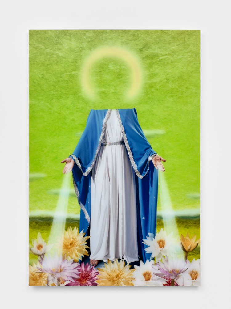 A headless Virgin Mary against a lime green background with lotus flowers at her feet and a halo above her.