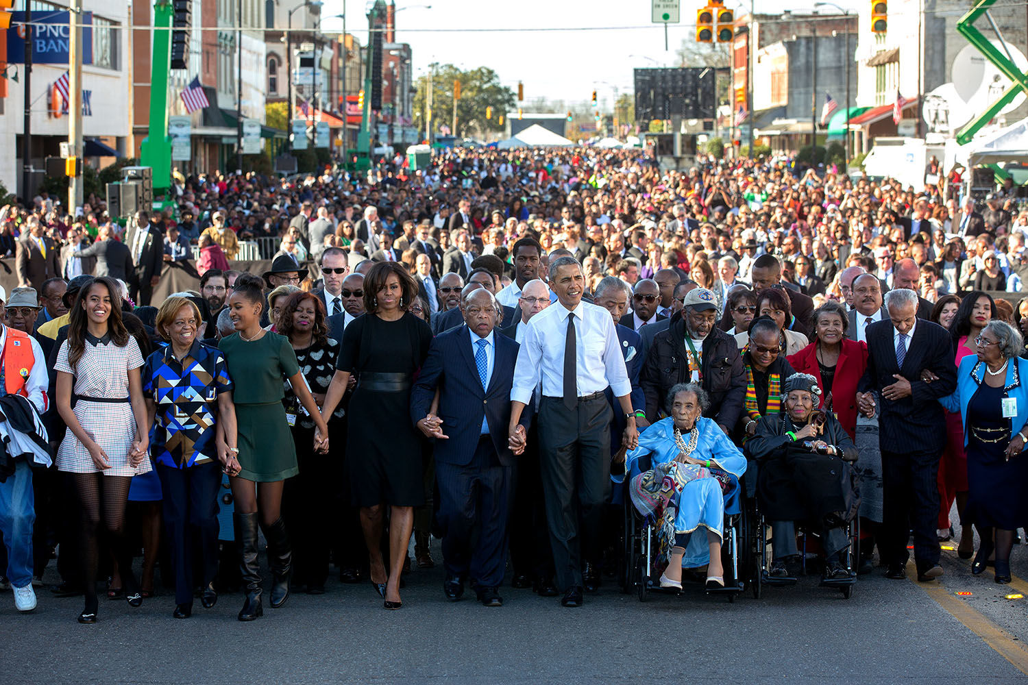 The First Family leads marchers across the Edmund Pettus Bridge, Selma, AL, March 7, 2015 (Courtesy Barack Obama Presidential Library)