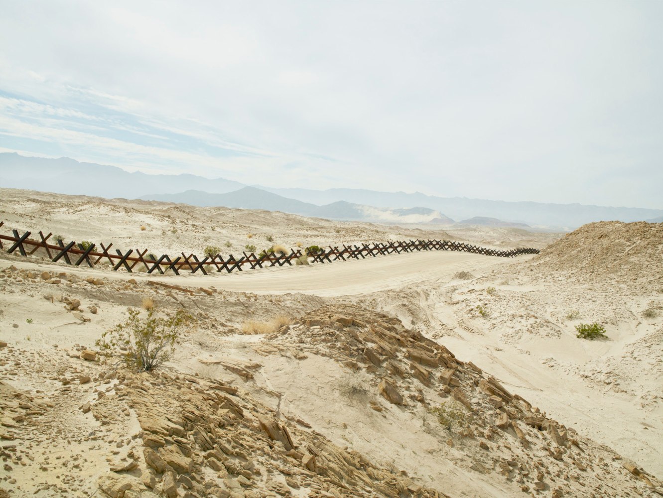 A photograph by Richard Misrach titled, 'Normandy Wall Near Ocotillo, California,' 2015