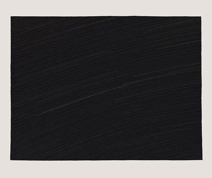 Black painting invoking moving stars
