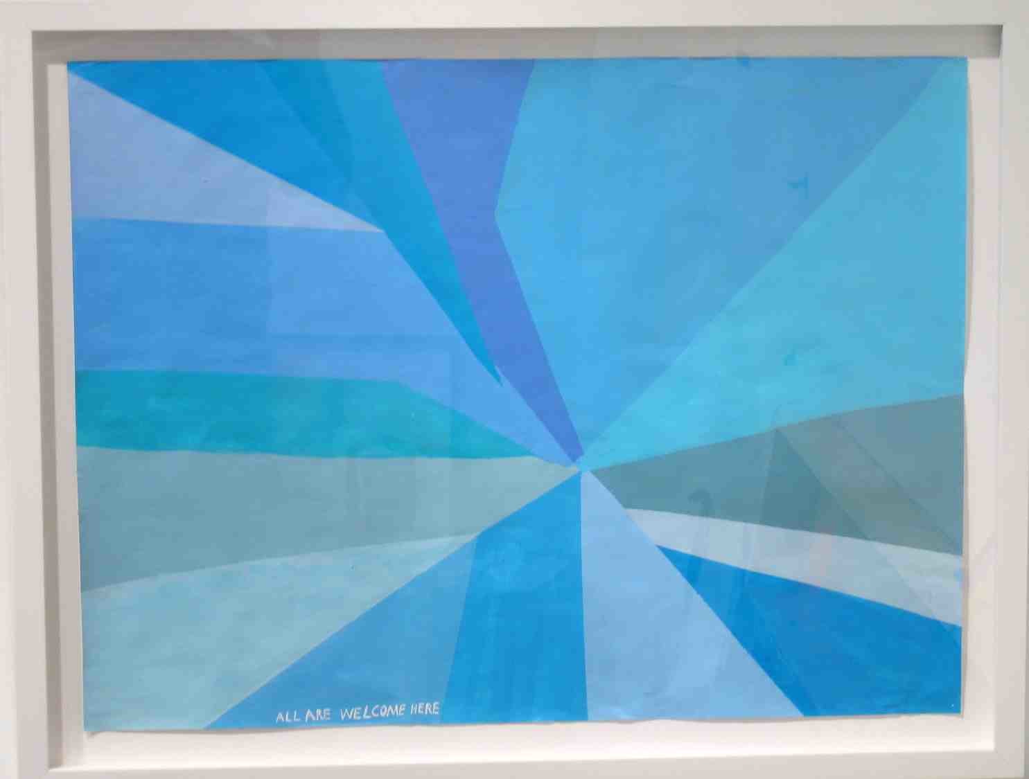 Framed blue geometric painting, reading 'all are welcome here'