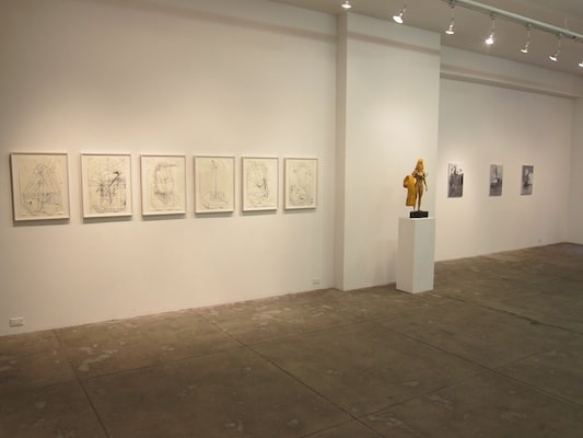 Installation view, sculpture and paintings