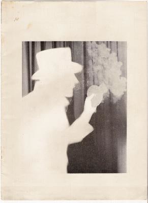 Silhouette image of man holding smoking jar