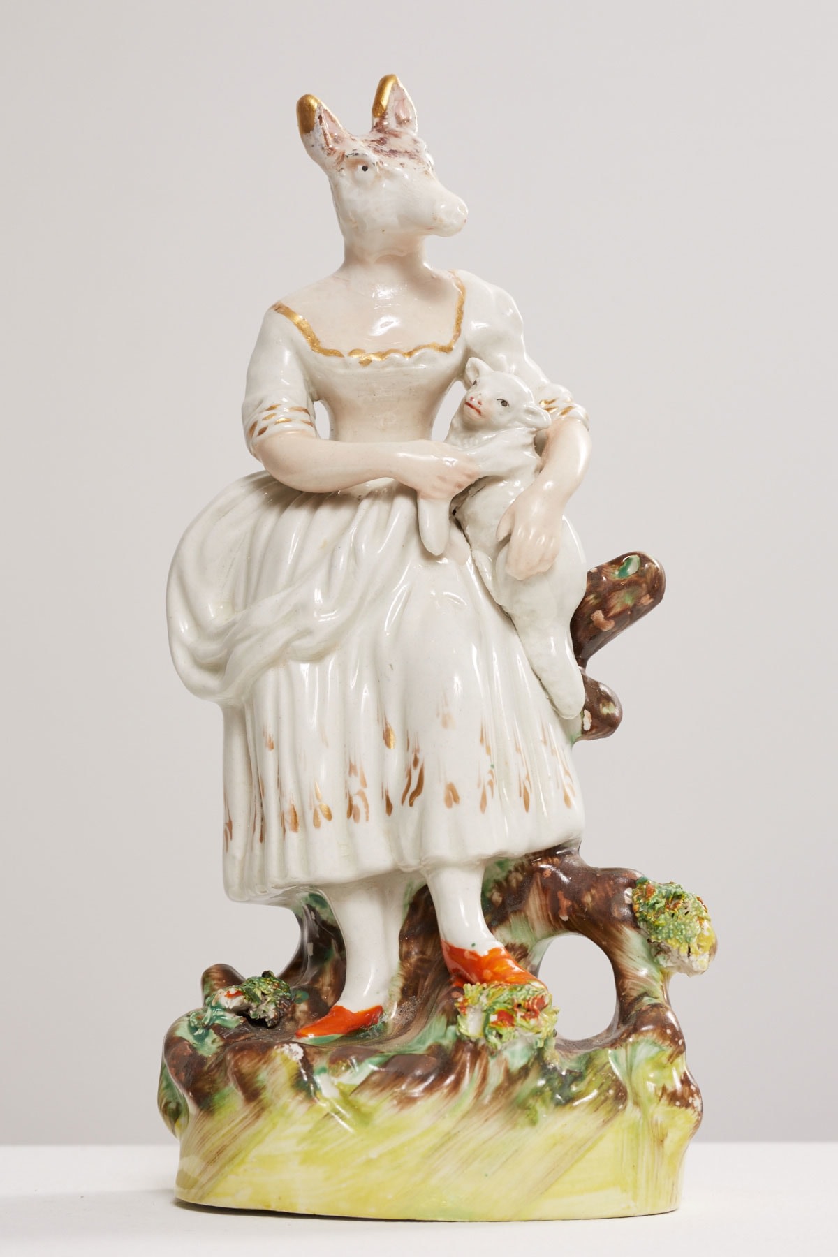 Amy Douglas painted ceramic, Horse headed woman holding calf