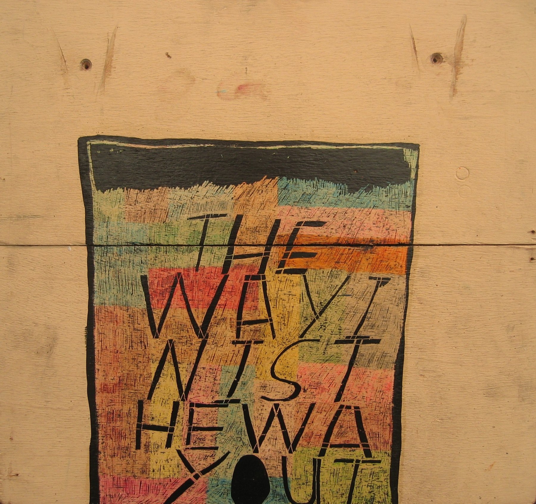McCarthy painting on found canvas, reading 'thewayInisthewayout'