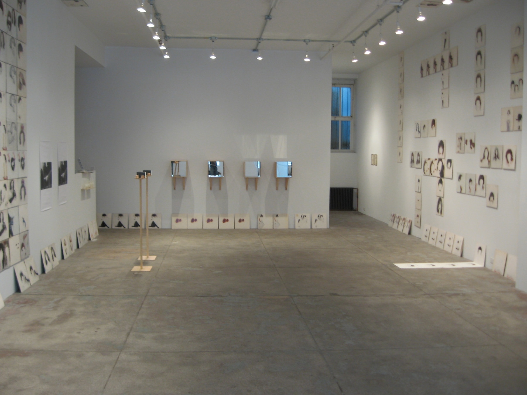 gallery view of hung portraits