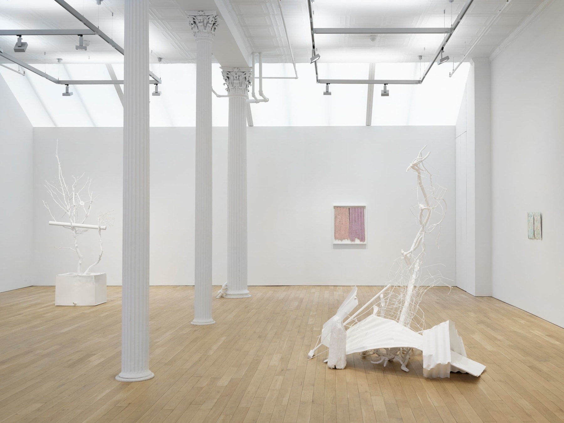 installation of white sculptures in a gallery