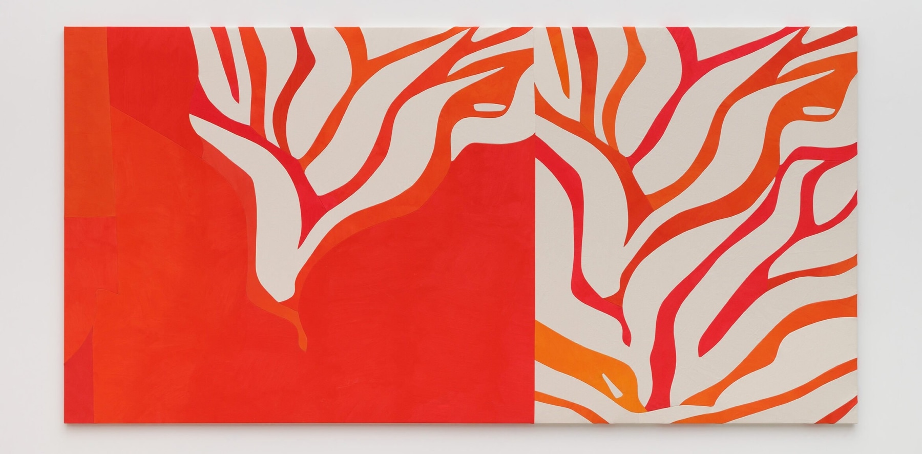 Abstract red and orange painting resembling tree branches