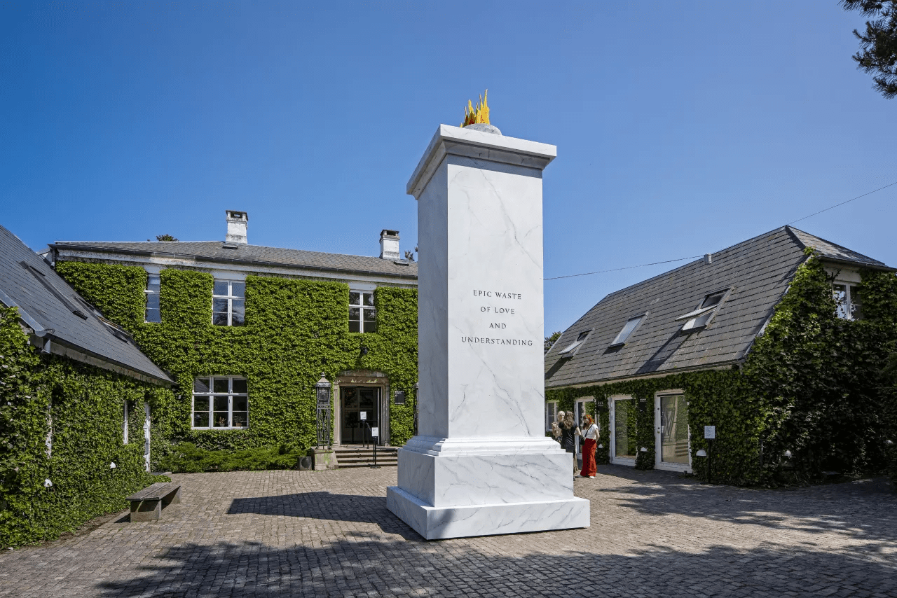 Large marble column in an outdoor courtyard