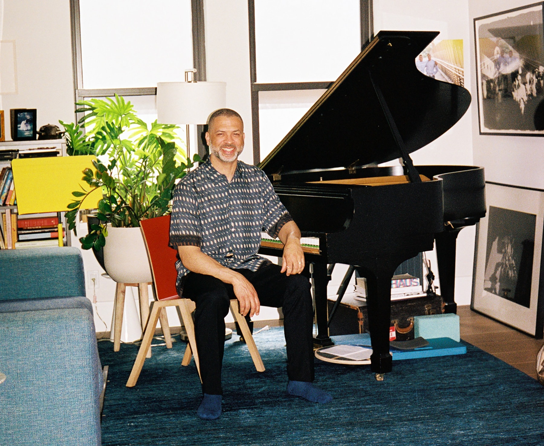 Jason Moran sitting in front of a grand piano 