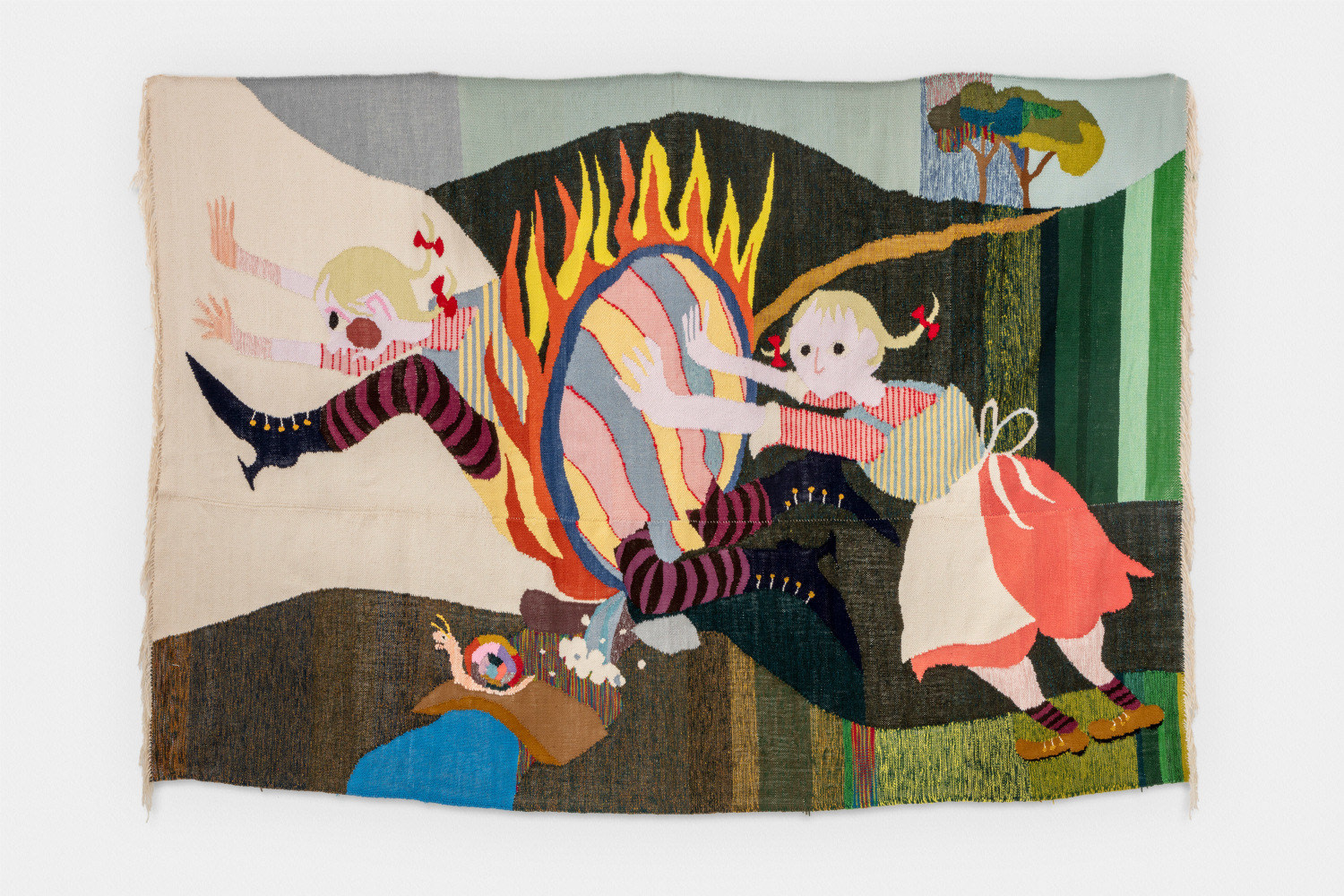 tapestry of 2 women jumping through a hoop of fire