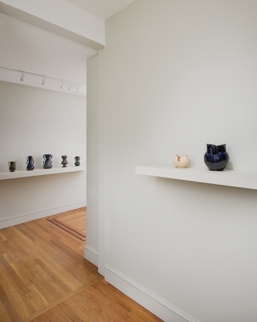 Installation view of George Ohr Pottery: No Two Alike on view at Craig F. Starr Gallery