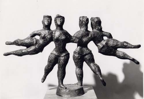 Symmetrical bronze sculpture of four female figures. Each side is identical with one ballerina standing on one leg with the other leg slightly pointed out, linking arms with the other ballerina who is flying horizontally out to the side.