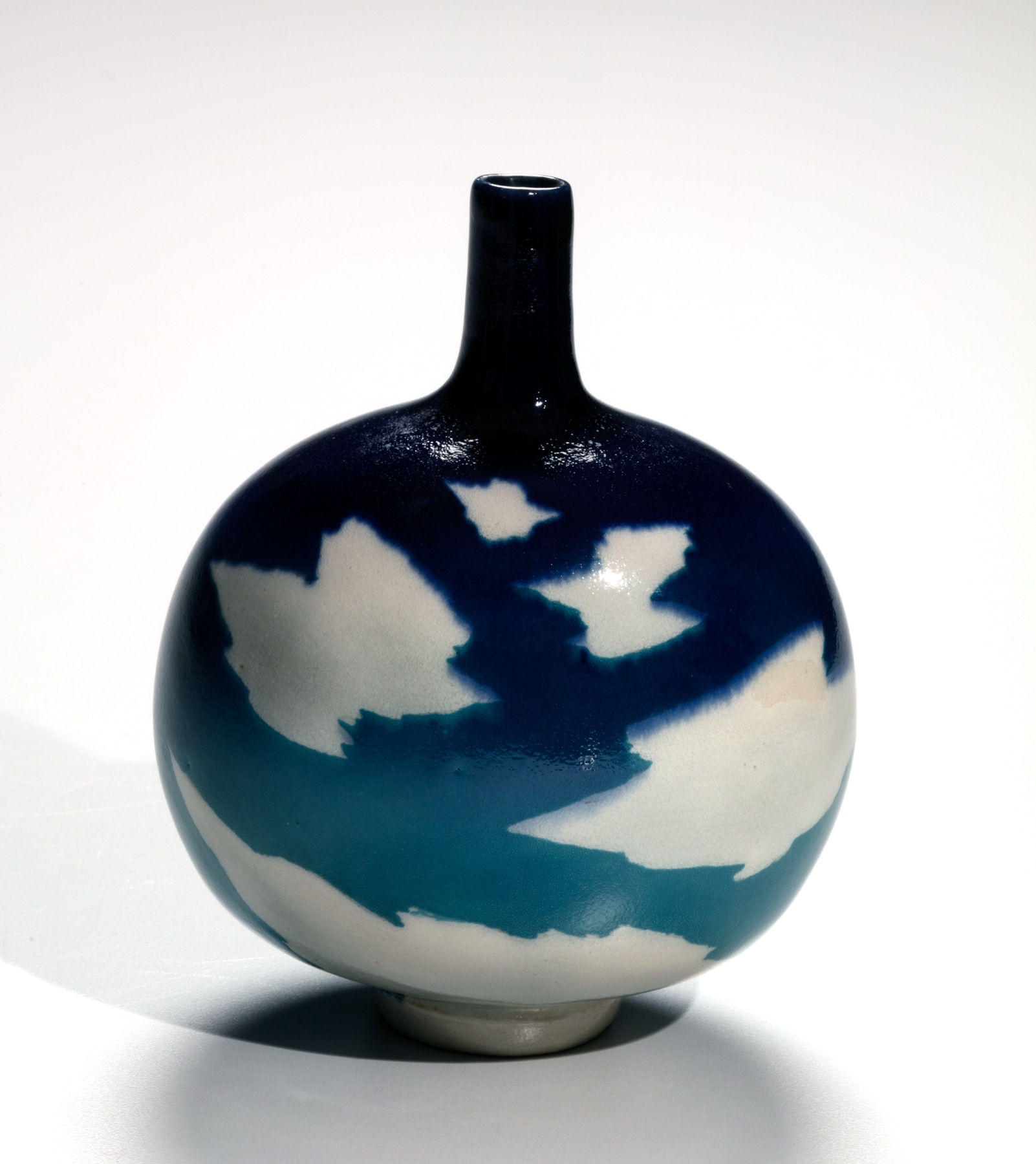 Yanagihara Mutsuo (b. 1934), Small, round vase with thin raised neck and patterned with white clouds against a blue-sky glazing