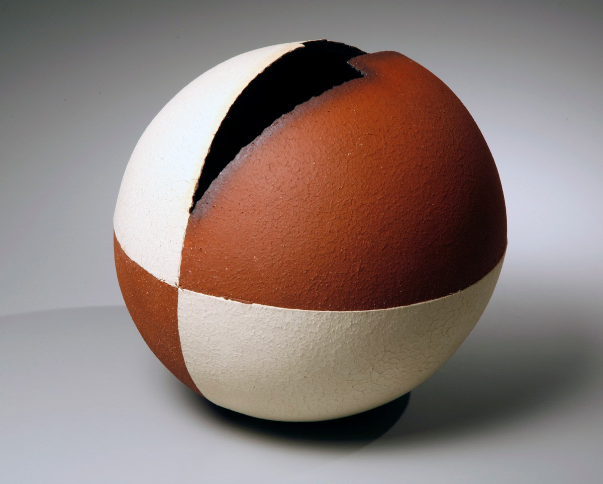 Spherical sculptural vessel with adjacent quadrants in crackled matte white glaze, 2007