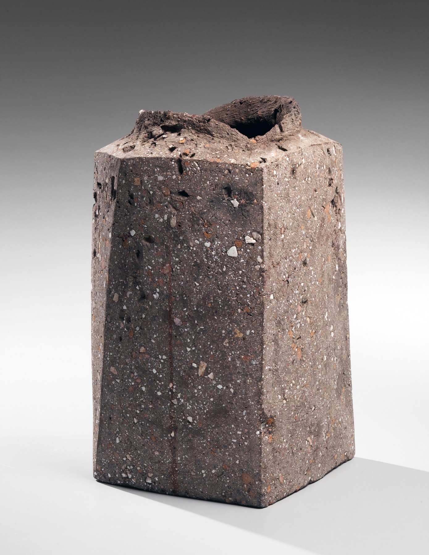 Itō Sekisui V (b. 1941), Standing four-sided rough grey vessel with raised torn mouth