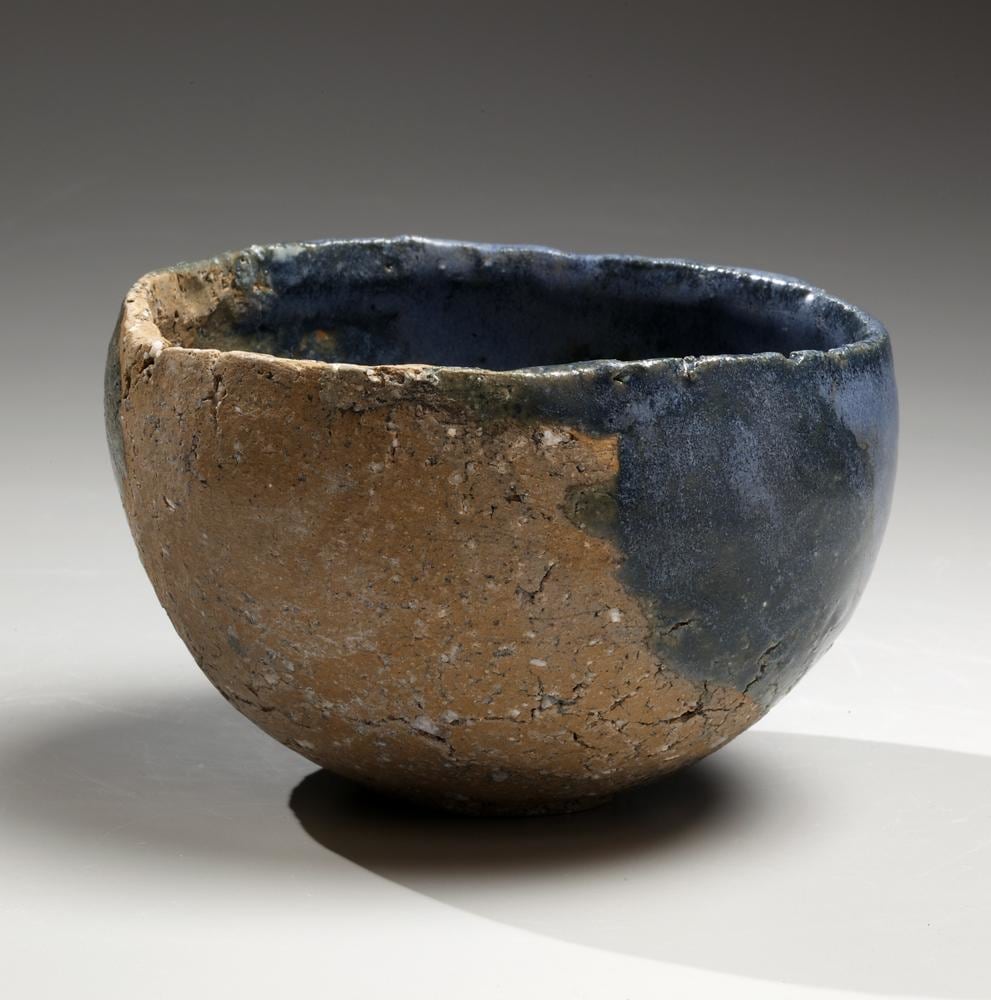 Round teabowl with unctuous greenish-blue ash glaze over cracked clay feldspar-infused body