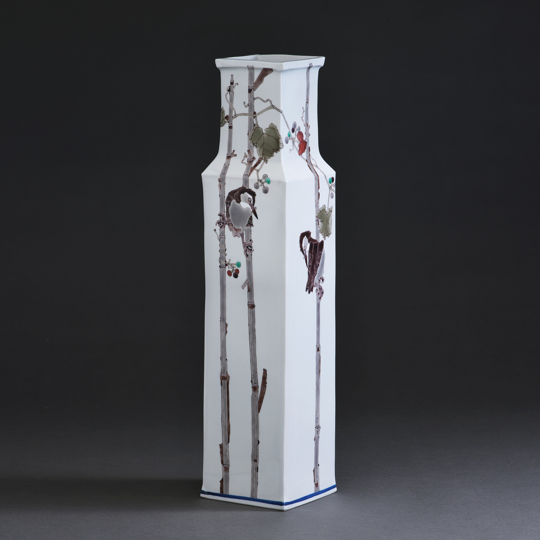 Takegoshi Jun (b. 1948), Long square vessel with sloped shoulders depicting Asian grape vine and reed warblers