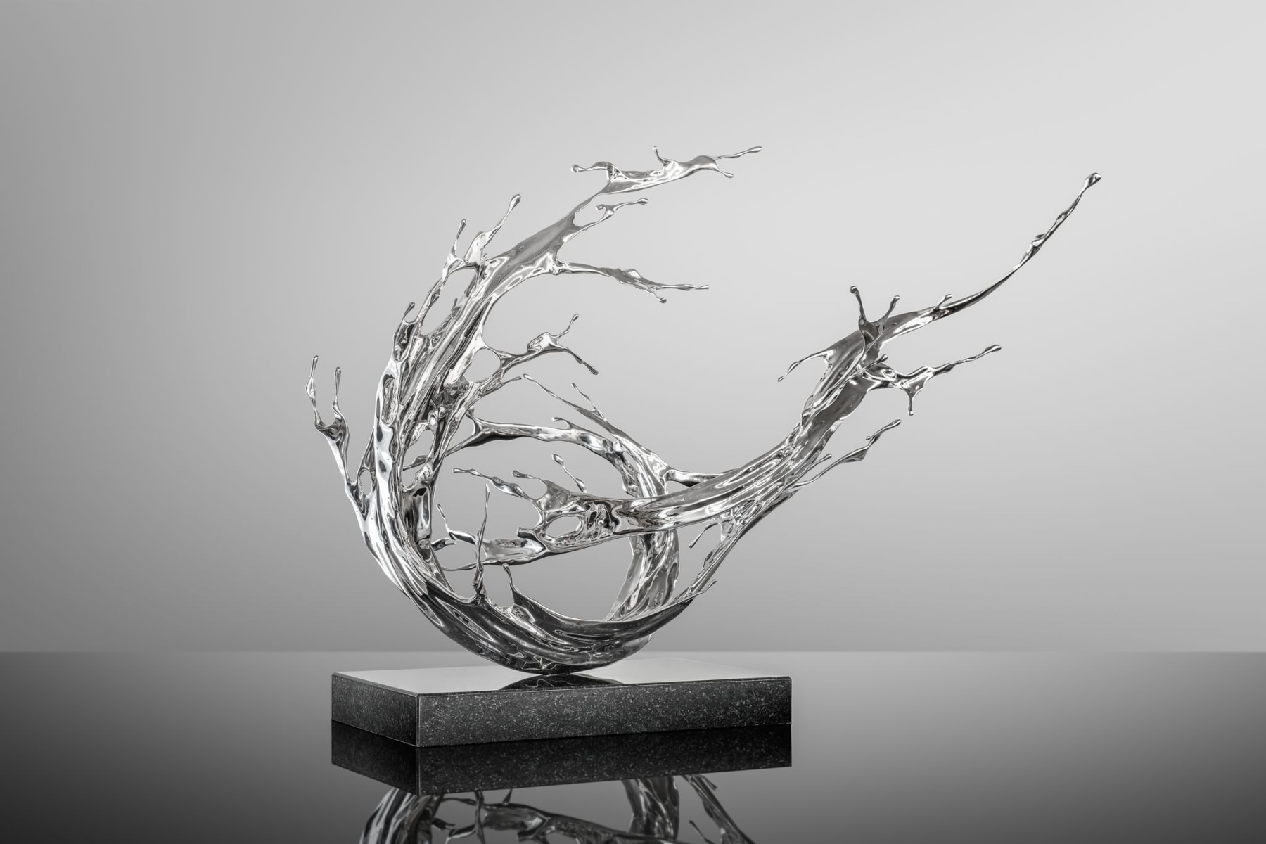 Water in Dripping - Tidal, 2024, stainless steel, 22 x 27.6 x 15.8 inches/56 x 70 x 40 cm