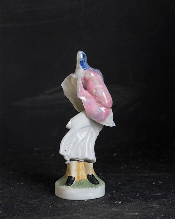 Color photograph of figurine